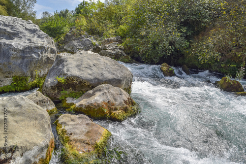 Rapids and rocks on the Cetina River in Omis, Croatia
