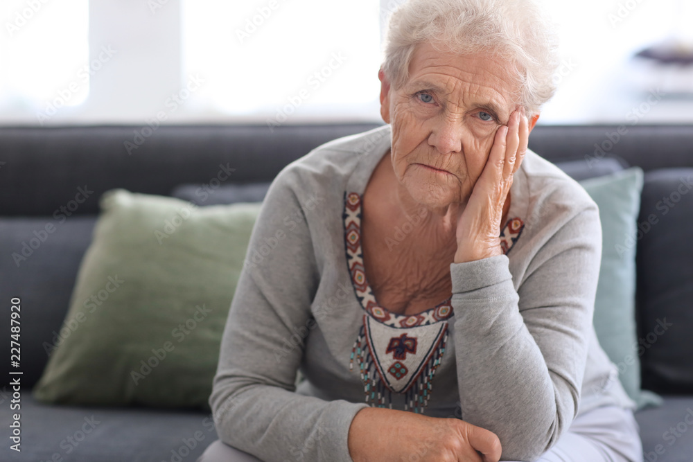Depressed elderly woman at home Depressed elderly woman at home