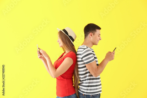 Young couple with mobile ph...