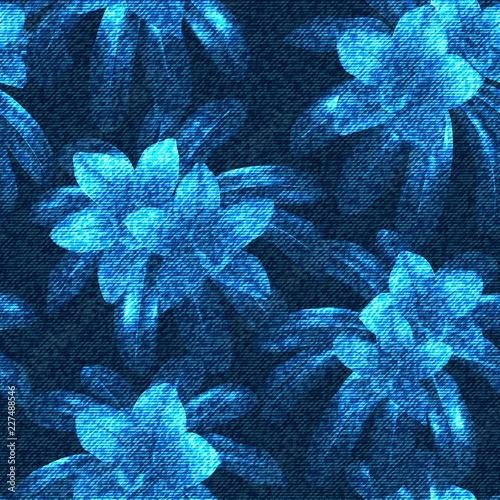 Floral vector seamless pattern. Blue flowers on the dark blue backdrop. The effect of embroidery on denim