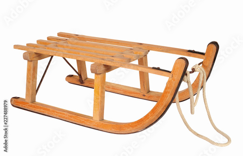 wooden sledge isolated over white background