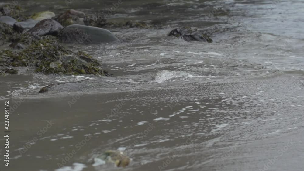 waves breaking on shore
