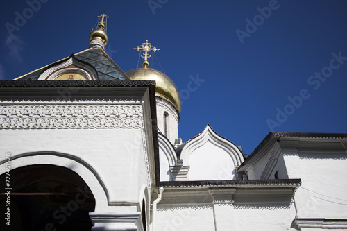 white temple with Golden domes photo