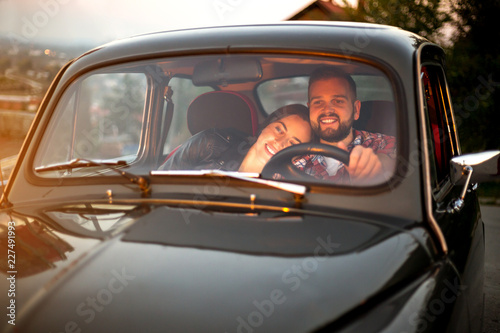 Young Couple Trip With Vintage Car