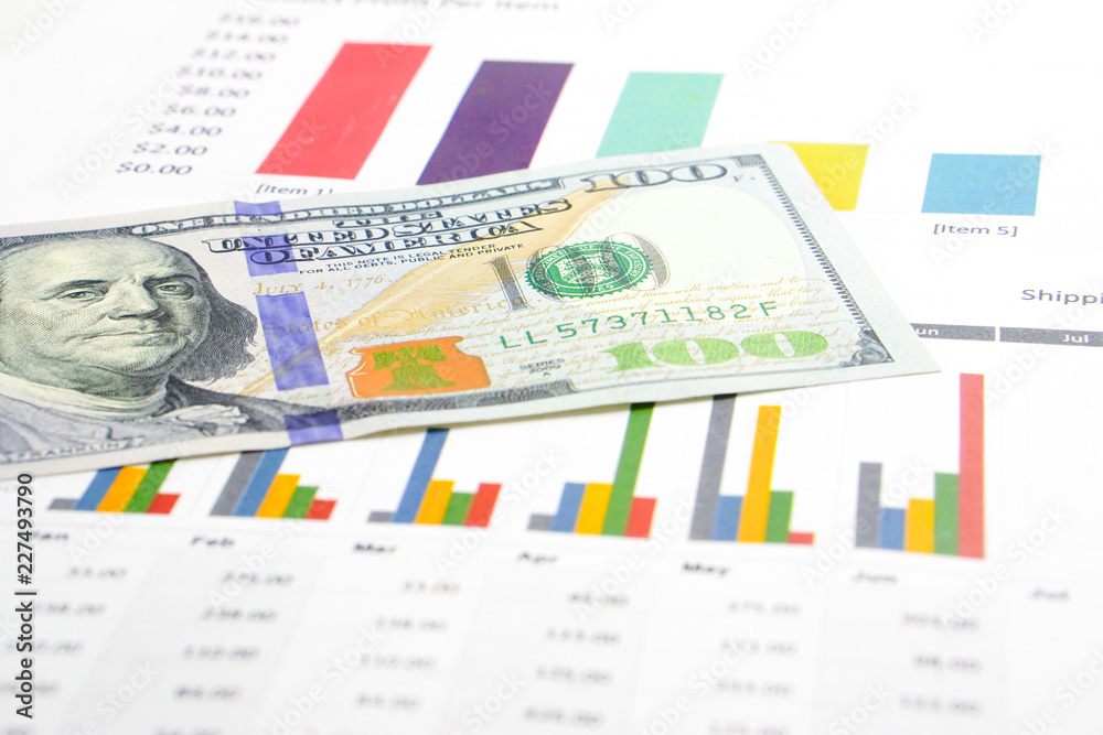 US dollar banknotes money on chart graph spreadsheet paper. Financial development, Banking Account, Statistics, Investment Analytic research data economy, trading, office reporting Business c US dollar banknotes money on chart graph spreadsheet paper. Financial development, Banking Account, Statistics, Investment Analytic research data economy, trading, office reporting Business c