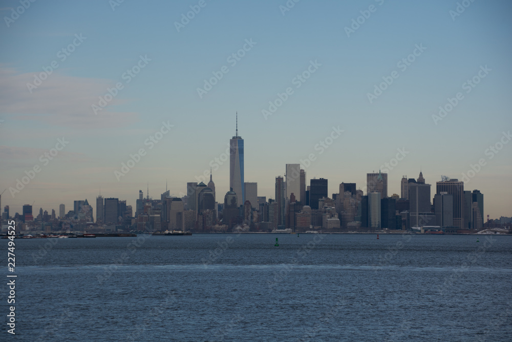 New York City skyline with Manhattan seen from Brooklyn on a clear winter day