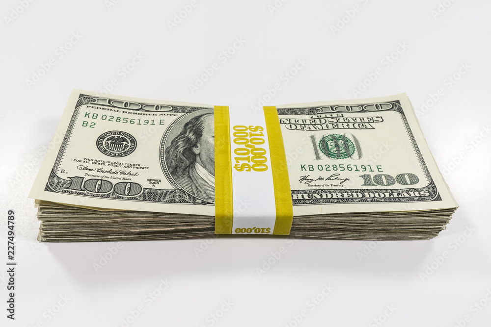 One hundred bills with $10000 paper currency strap.