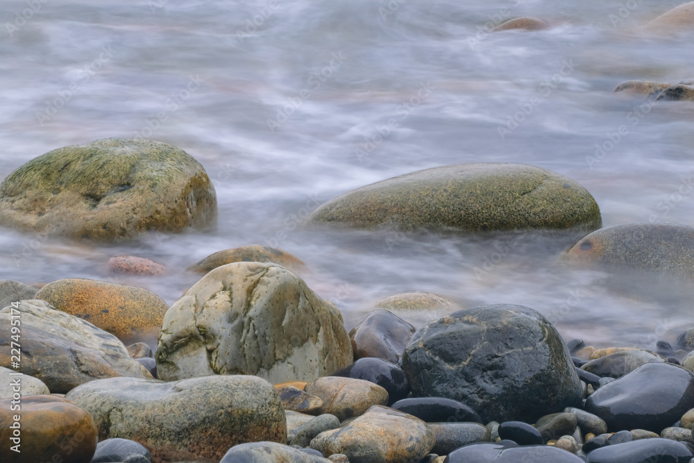 The Surf Washing Over Rocks at Boulder Beach, Acadia National Park, Maine The Surf Washing Over Rocks at Boulder Beach, Acadia National Park, Maine