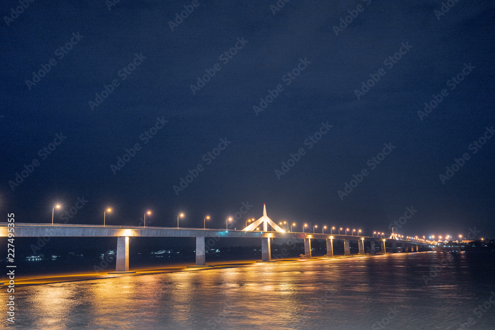 Second Thai–Lao Friendship Bridge at Night with Water Reflection