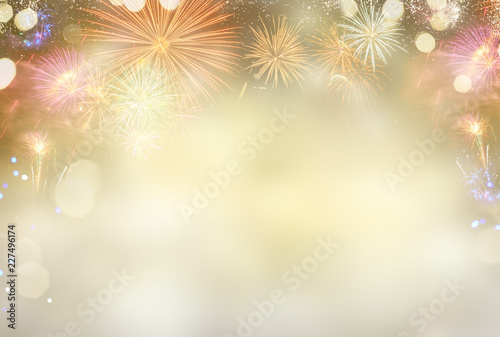 Abstract festive winter bokeh background with colorful fireworks and bokeh lights