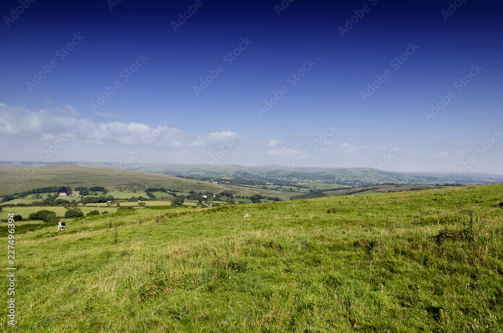 landscape of green fields with blue sky and clouds landscape of green fields with blue sky and clouds