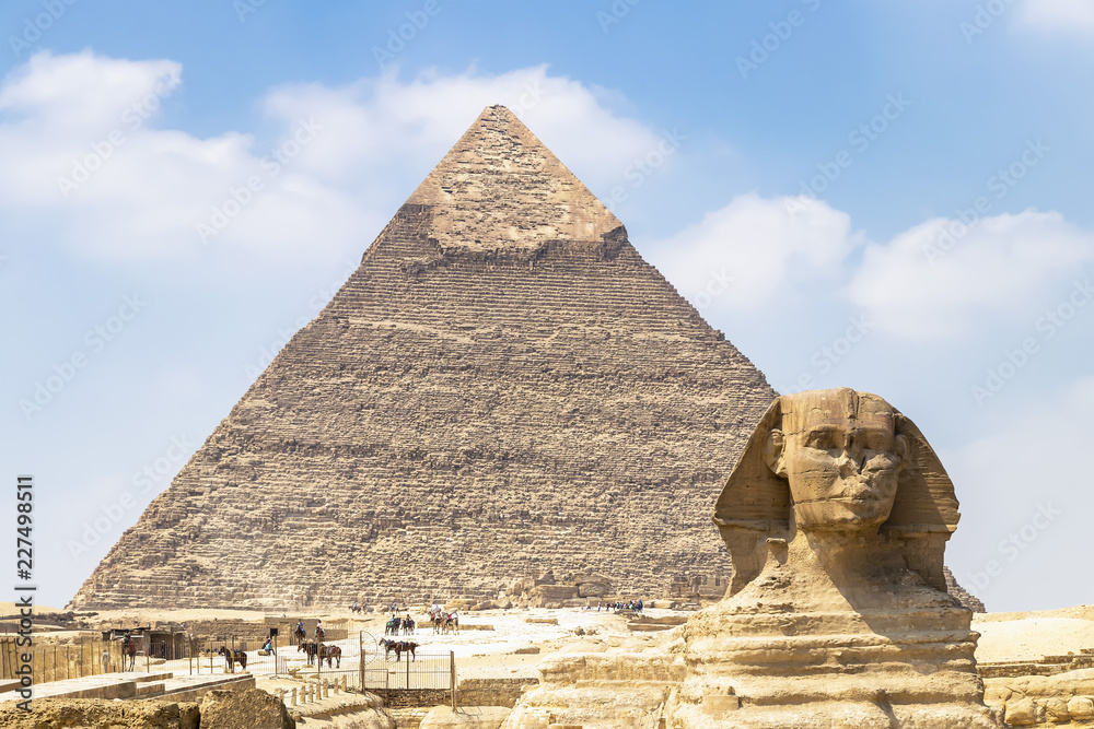 Spinx face on the Giza pyramid background, Cairo, Egypt Spinx face on the Giza pyramid background, Cairo, Egypt