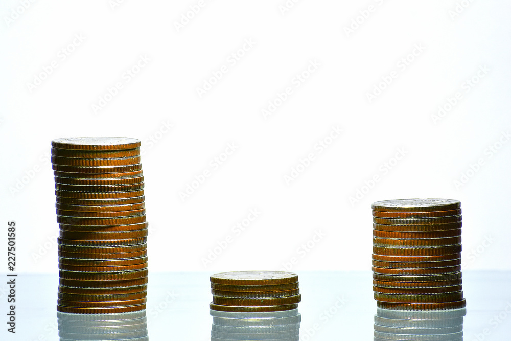 Money coin stack growing business on isolated White background, Spending money concept. Money coin stack growing business on isolated White background, Spending money concept.