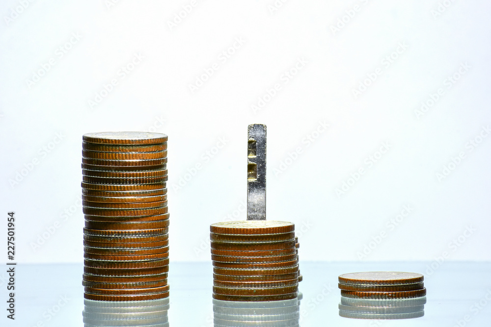 Money coin stack growing business on isolated White background, Key to Success concept.
