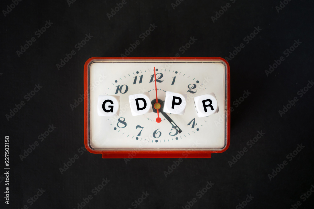General Data Protection Regulation concept. Letters GDPR with red clock on the black background General Data Protection Regulation concept. Letters GDPR with red clock on the black background