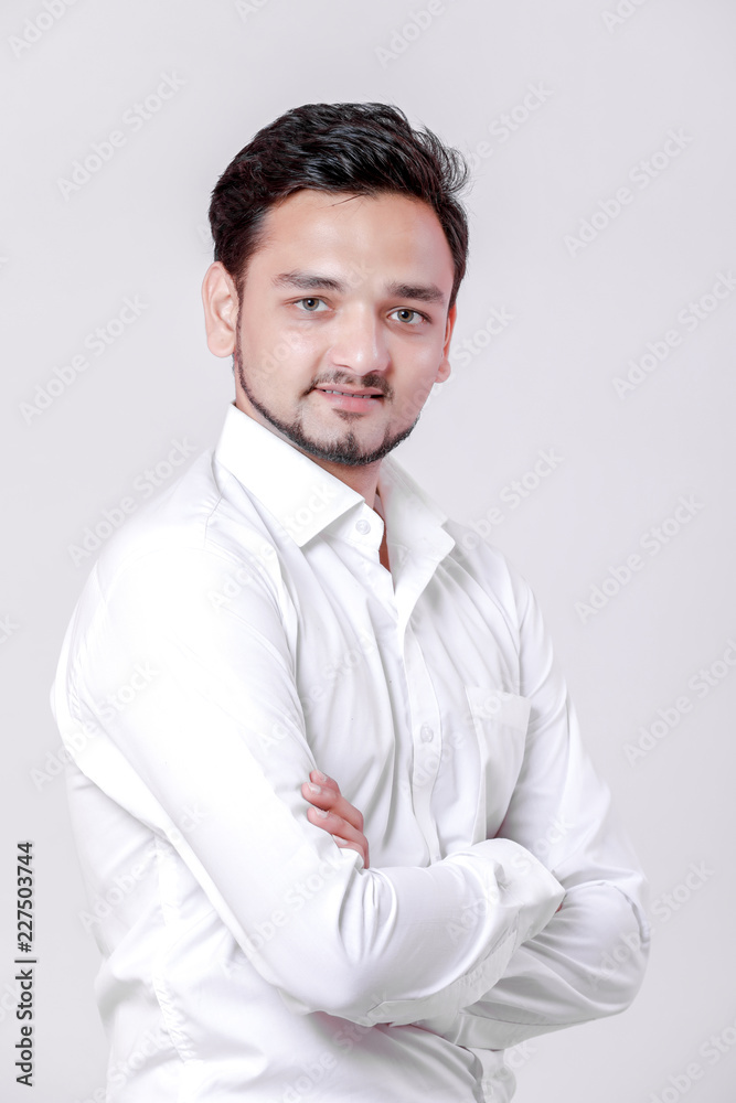 young indian man Standing isolated over white background young indian man Standing isolated over white background