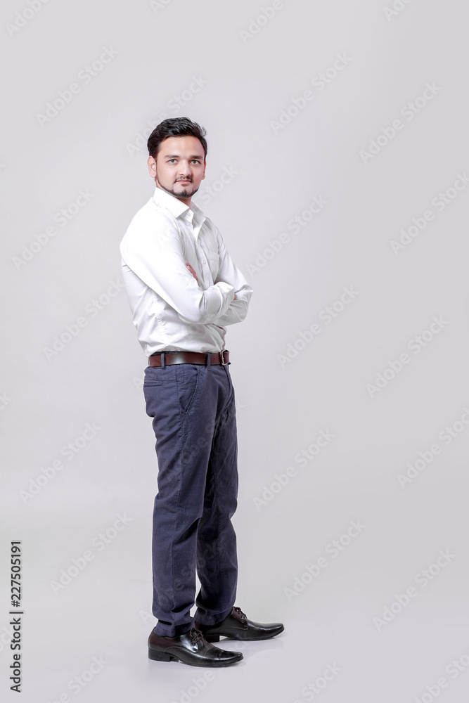 young indian man Standing isolated over white background young indian man Standing isolated over white background