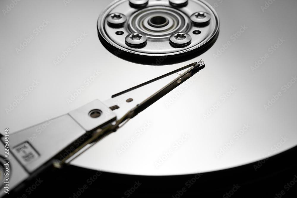 Close up of hard disk's internal mechanism hardware Close up of hard disk's internal mechanism hardware