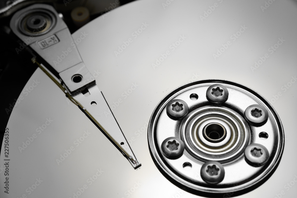 Close up of hard disk's internal mechanism hardware Close up of hard disk's internal mechanism hardware