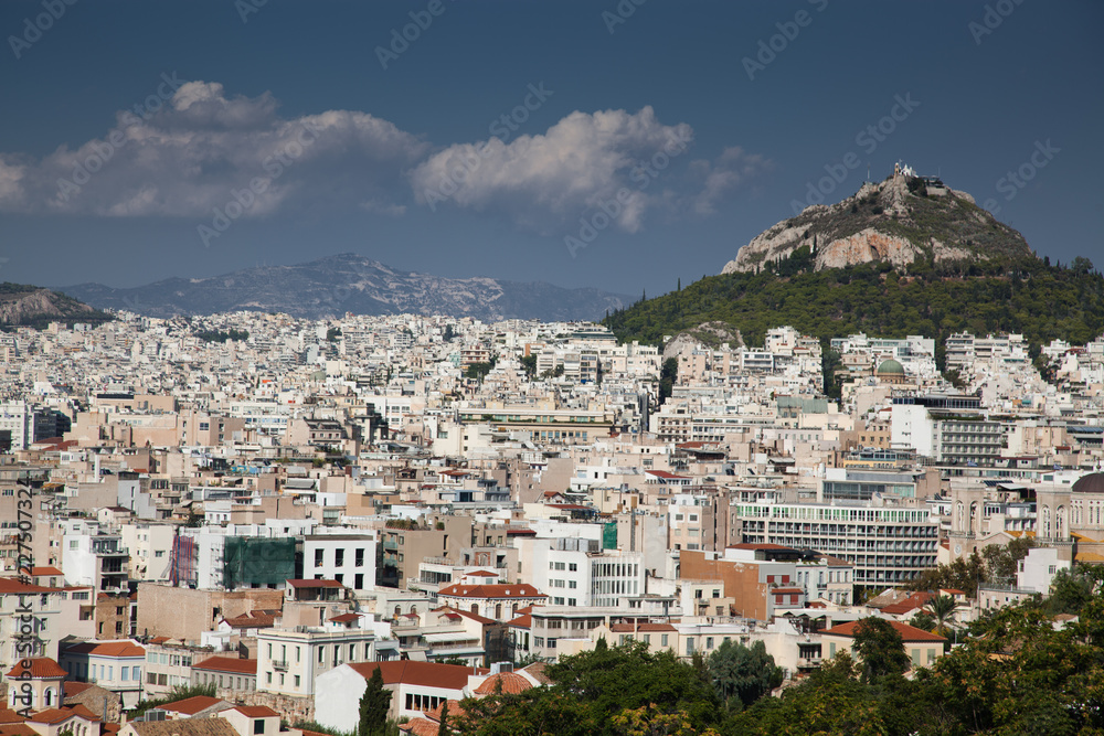 cityscape of Athens with Lycabettus hill in the background