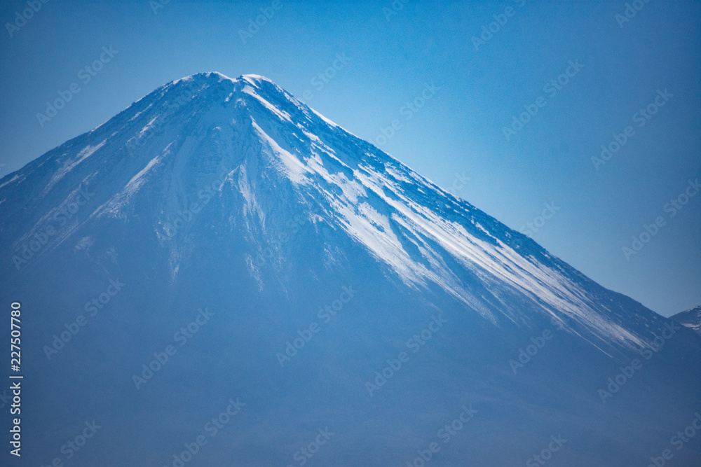 Artacama desert, Chile with view of volcano on a sunny day with blue sky Artacama desert, Chile with view of volcano on a sunny day with blue sky