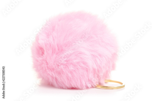 Fur ball pink trinket on white background isolation photo