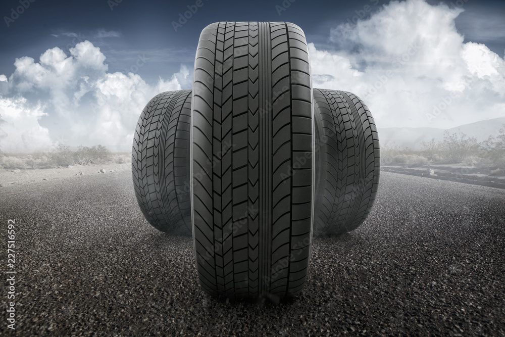 Car tires concept on a road Car tires concept on a road