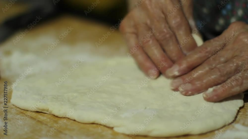 grandmother prepares classical italian pizza grandmother prepares classical italian pizza