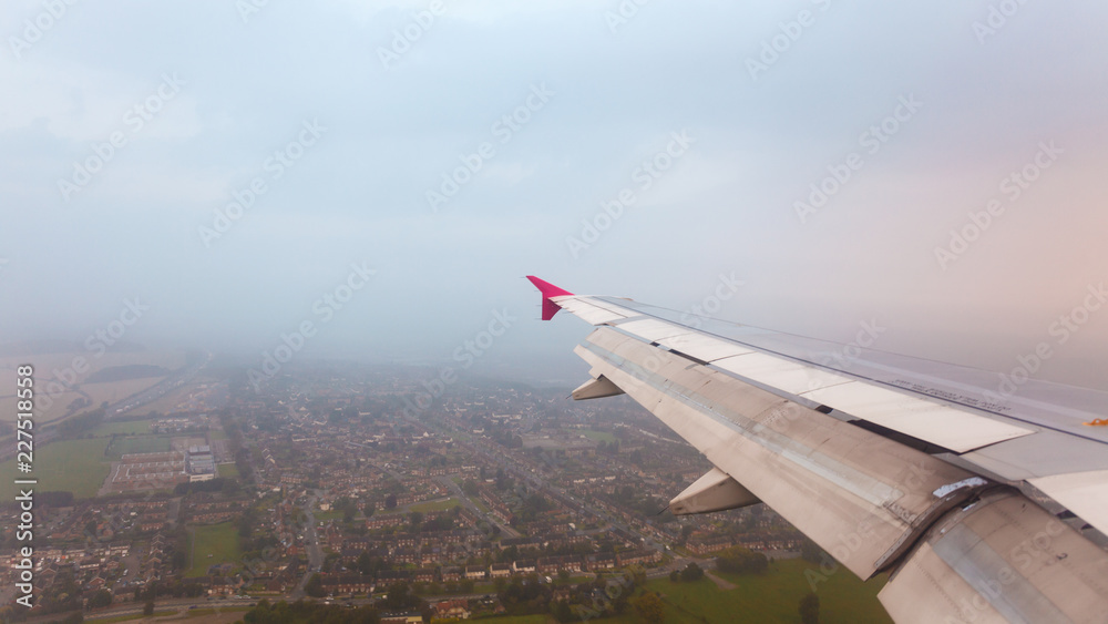View from plane window. City view View from plane window. City view