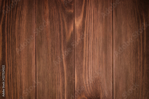 Detailed closeup of brown wood texture background.