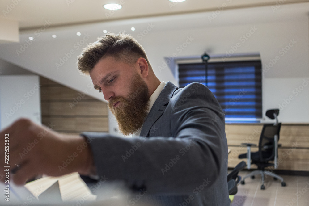 Fototapeta premium Businessman siting in office late night work