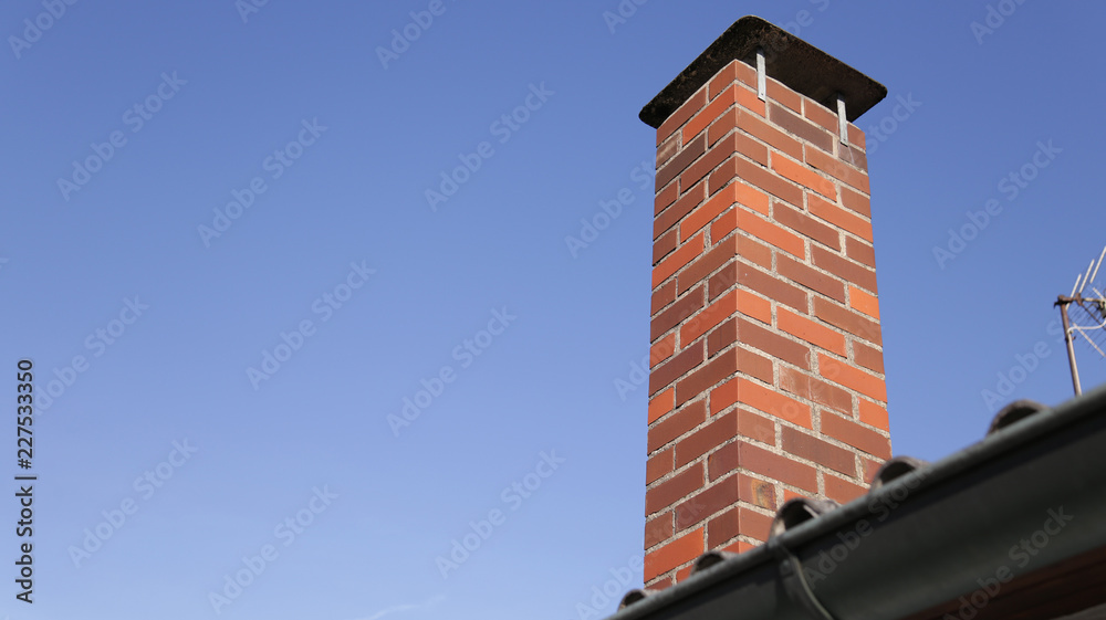 Red Brick Chimney Close up Blue Sky Background