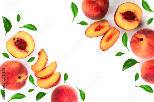 ripe peaches with leaves isolated on white background with copy space for your text. Top view. Flat lay pattern