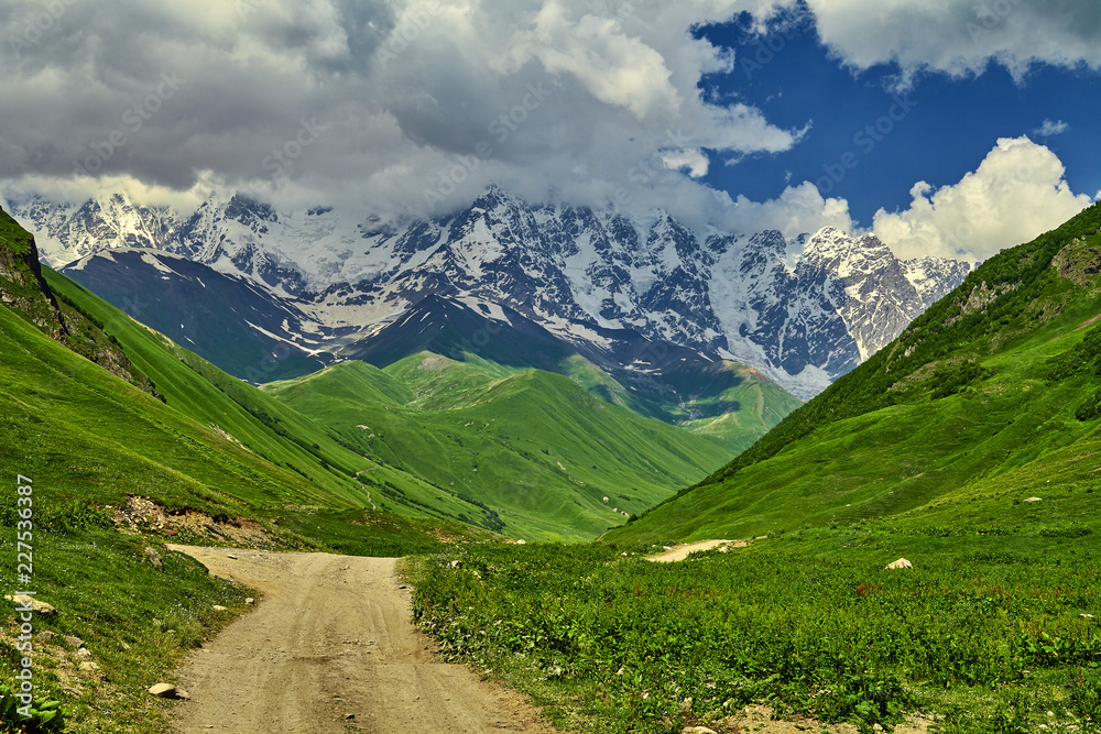 Fototapeta premium Beautiful landscape of mountain Georgia. Caucasus mountains and ancient national villages.
