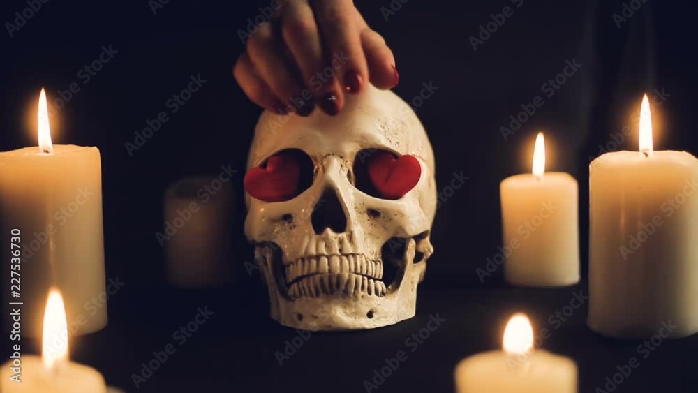 a magical ceremony with a skull and candles a magical ceremony with a skull and candles