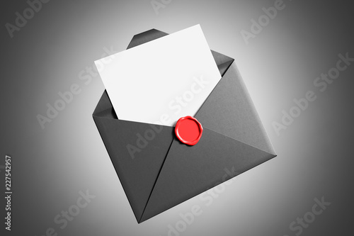 Open gray envelope over gray background