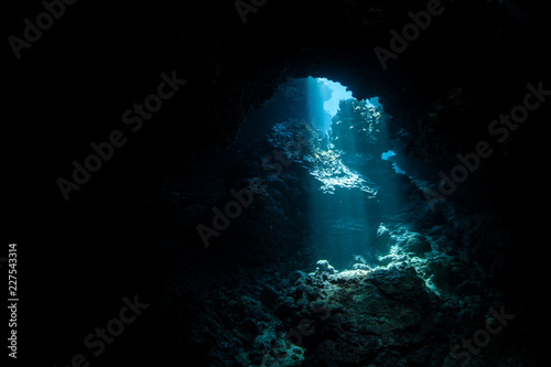 Sunlight Descending Into Dark, Underwater Cavern