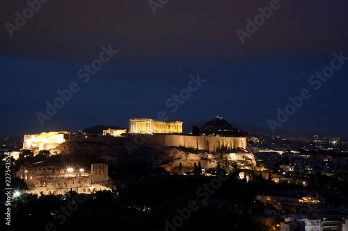 athens seen from Philopapou hill with views to Herodium , Acropolis and the Parthenon at blue hour, Attica, Greece