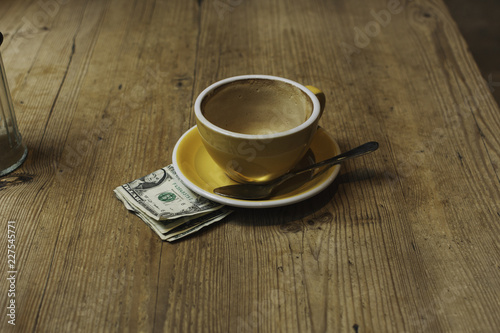 Empty coffee cup with payment