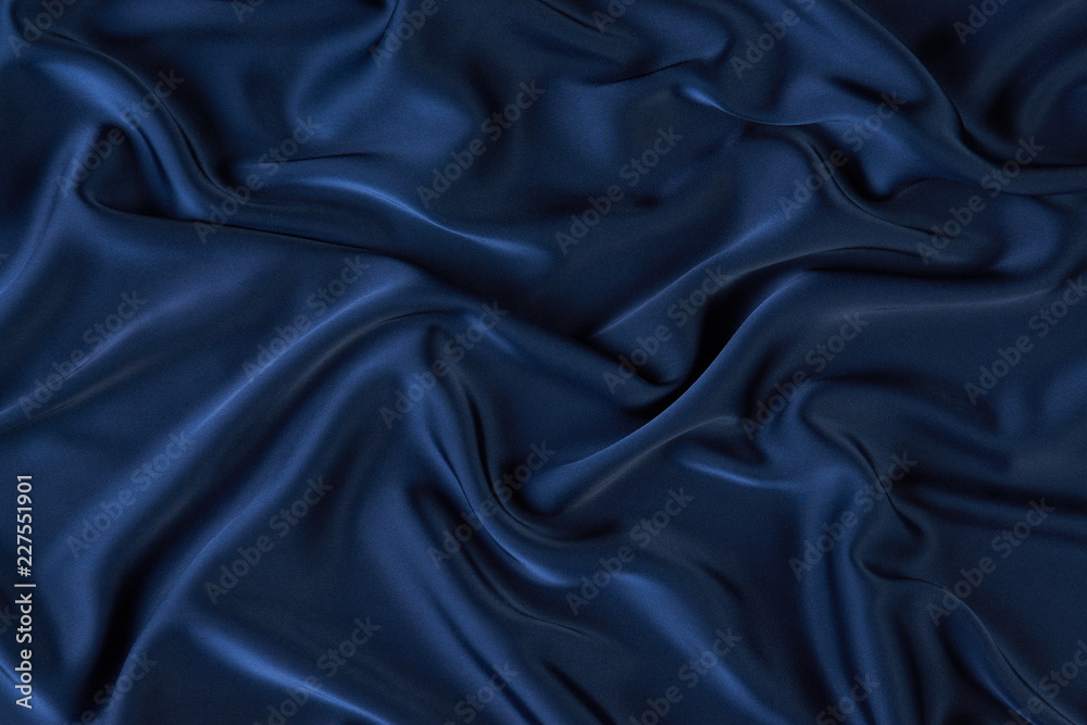 Fototapeta premium Dark blue silk fabric background, view from above. Smooth elegant blue silk or satin luxury cloth texture can use as abstract background with copy space, close-up 
