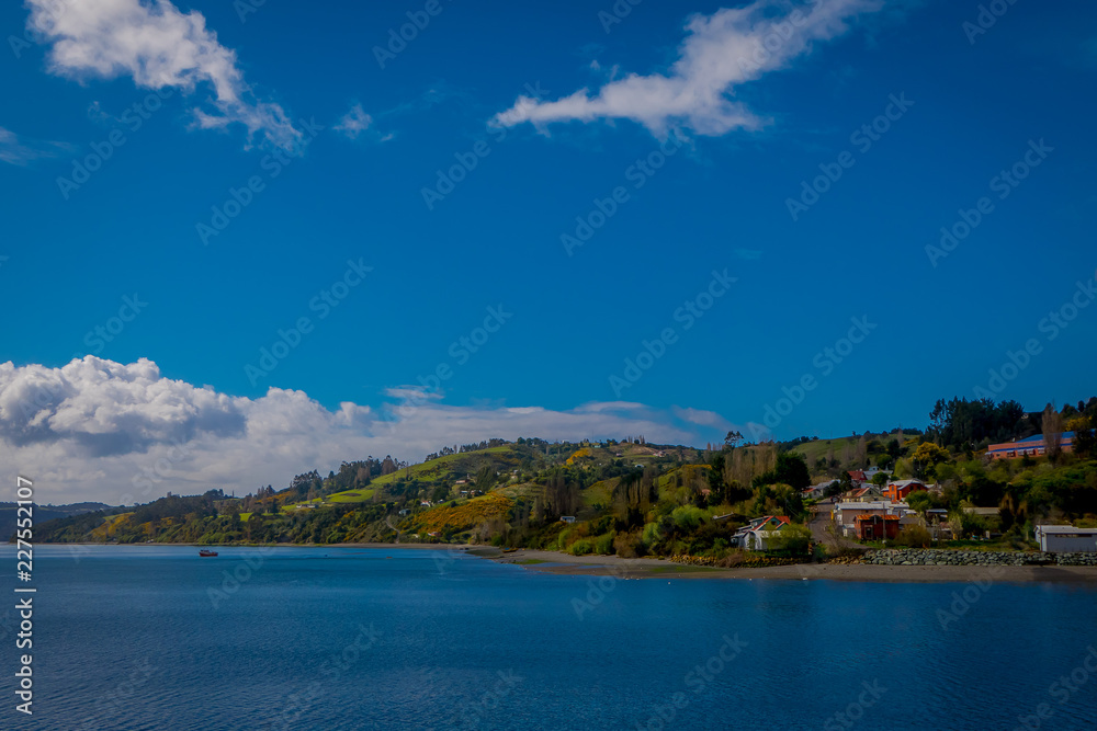 Beautiful outdoor landscape of some house buildings located at palafitos in Castro, Chiloe Island, Patagonia