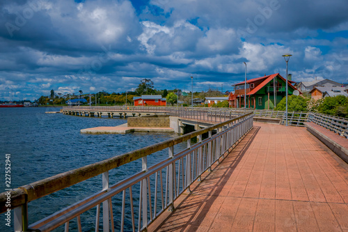 Outdoor view of gorgeous and modern stoned pier located in Chacao, Chiloe - Chile photo