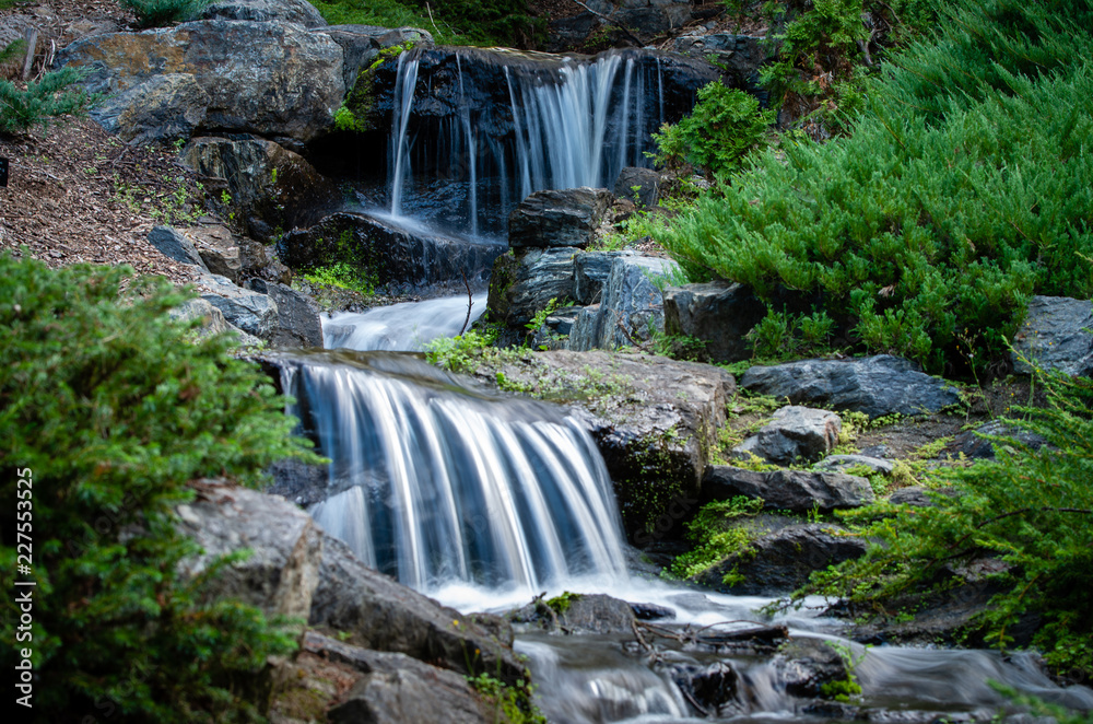 Naklejka premium waterfall in forest
