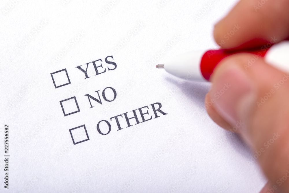 Hand with pen near options YES NO OTHERS Hand with pen near options YES NO OTHERS