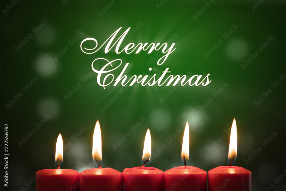 Five bright candles with Merry Christmas text Five bright candles with Merry Christmas text