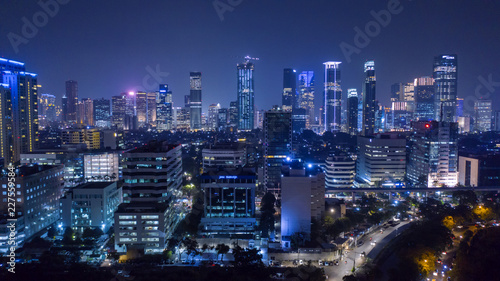 Jakarta city with glowing light skyscrapers