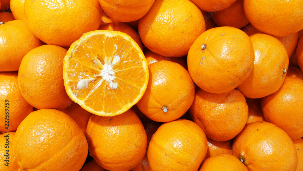 Fresh oranges, oranges background, bunch of fresh organic oranges. Big bunch of ripe tangerines. Fresh oranges, oranges background, bunch of fresh organic oranges. Big bunch of ripe tangerines.