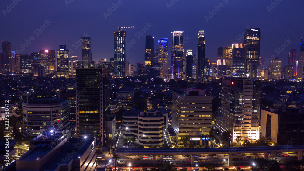 Fototapeta premium Modern skyscrapers in Sudirman CBD at night