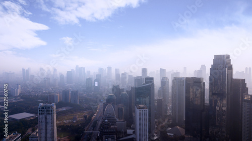 Modern skyscrapers with air polluted at morning