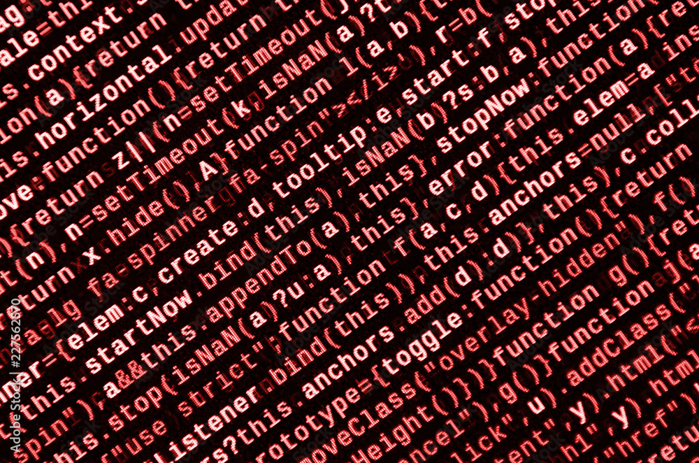 Writing programming code on laptop digital binary data on computer